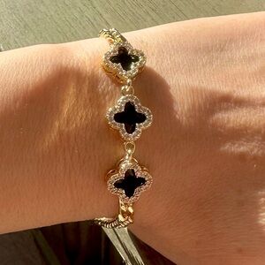 Gold color with triple black clover bracelet